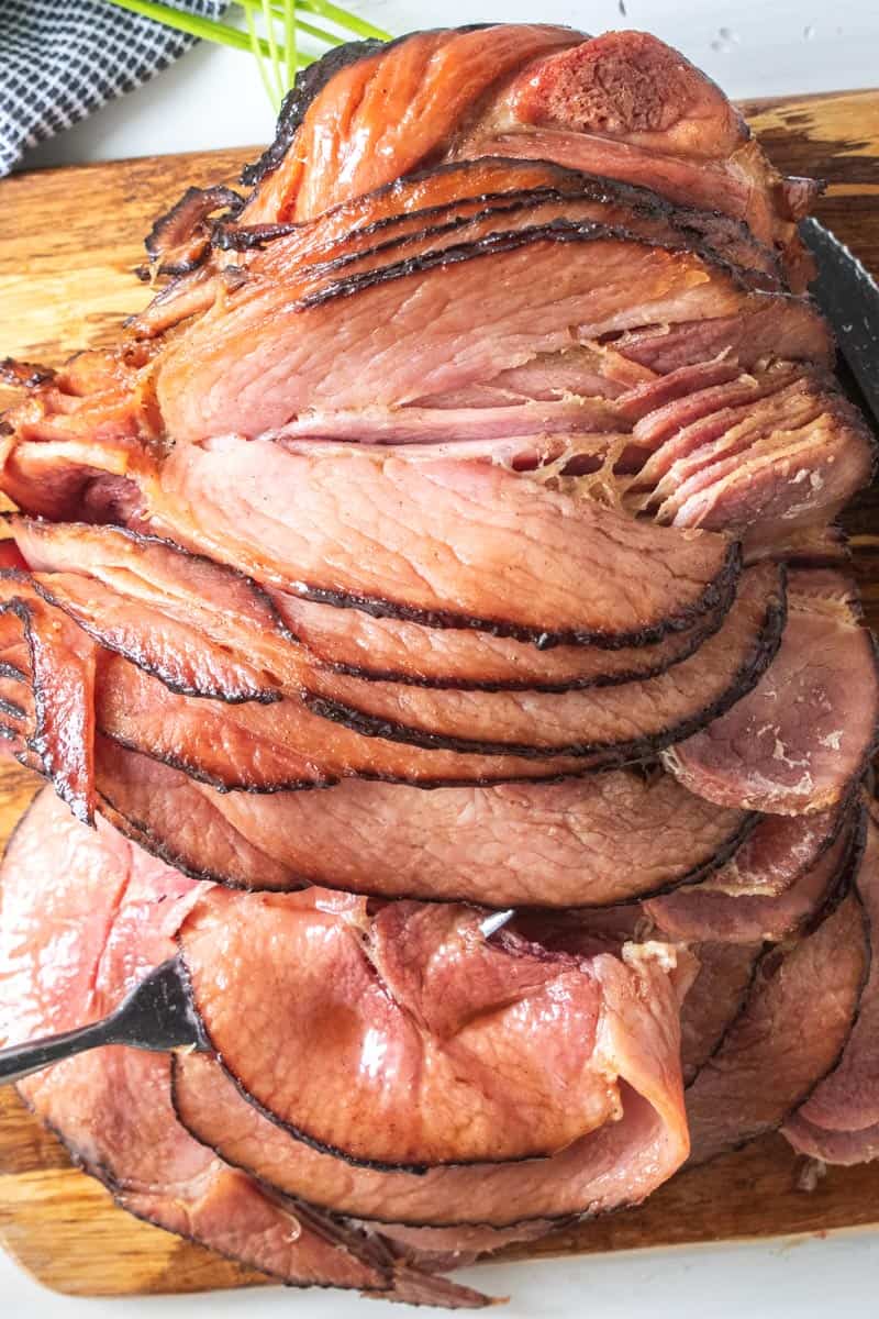 spiral ham on wooden board