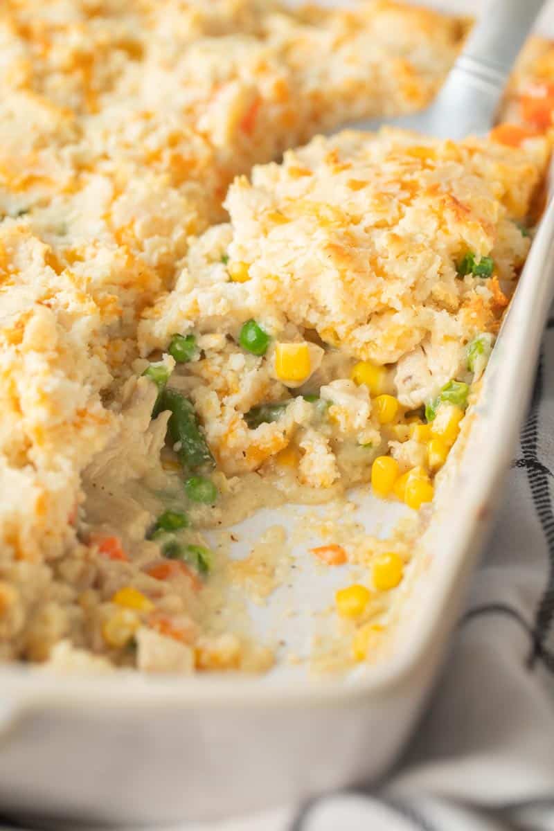 casserole dish of chicken pot pie with biscuit topping