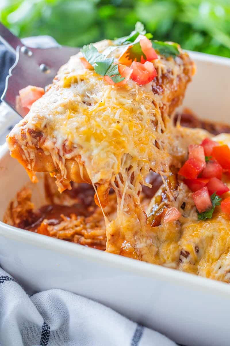 cheesy burrito scooped from casserole dish