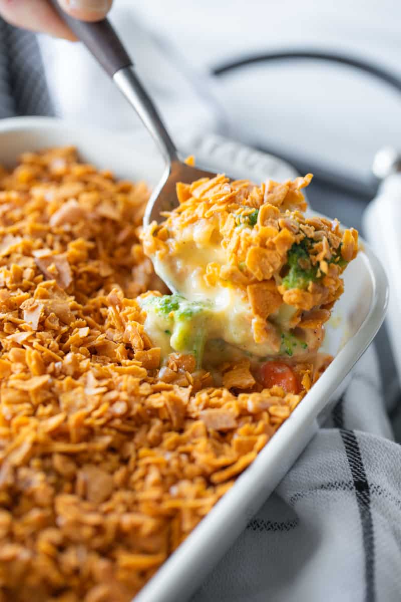 spoon scooping vegetable casserole from a dish