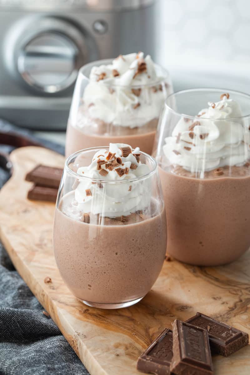 frozen hot chocolate topped with whipped cream and grated chocolate