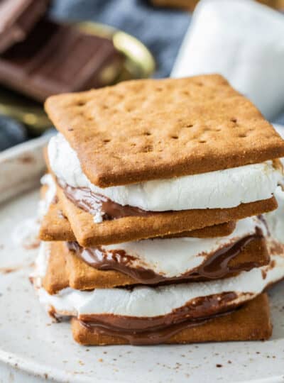 smores stacked up three high on a plate