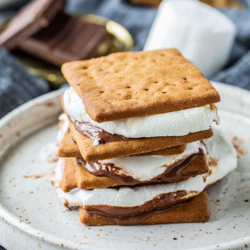 smores stacked up three high on a plate
