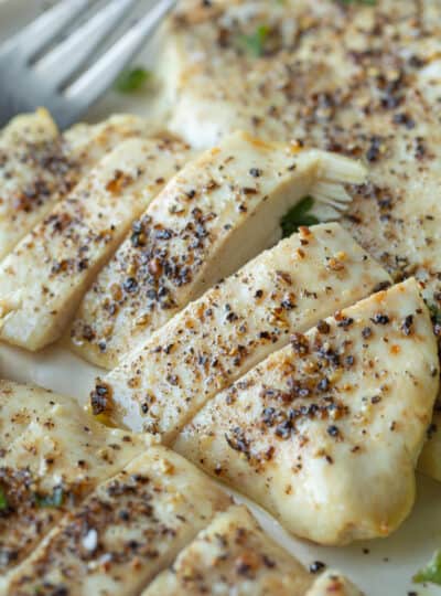 thin sliced chicken breasts on a plate