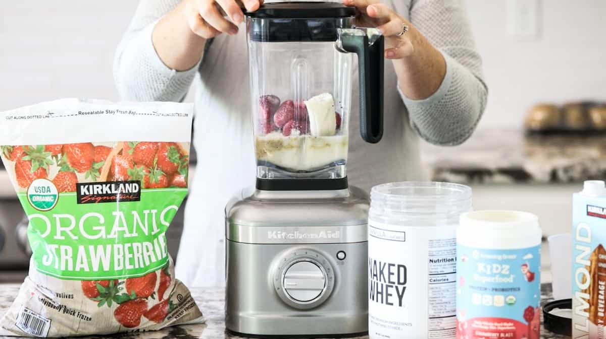 fruit and milk in a blender