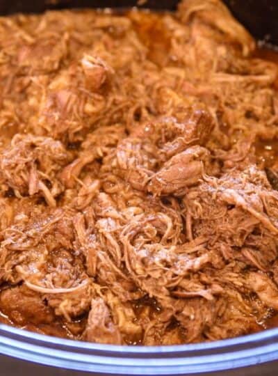 pulled pork in a crockpot after cooking