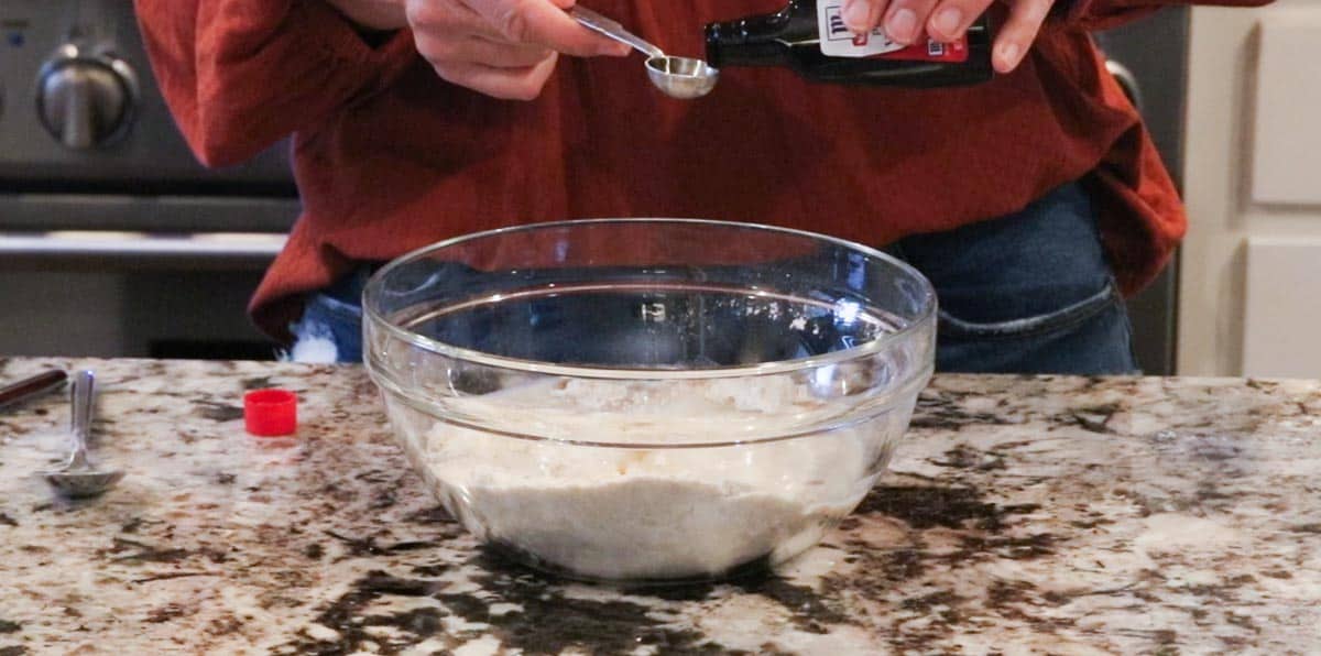 adding ingredients to a bowl