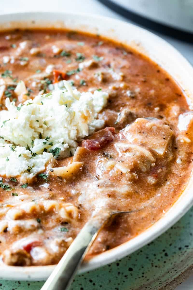 spoon in a bowl of lasagna soup