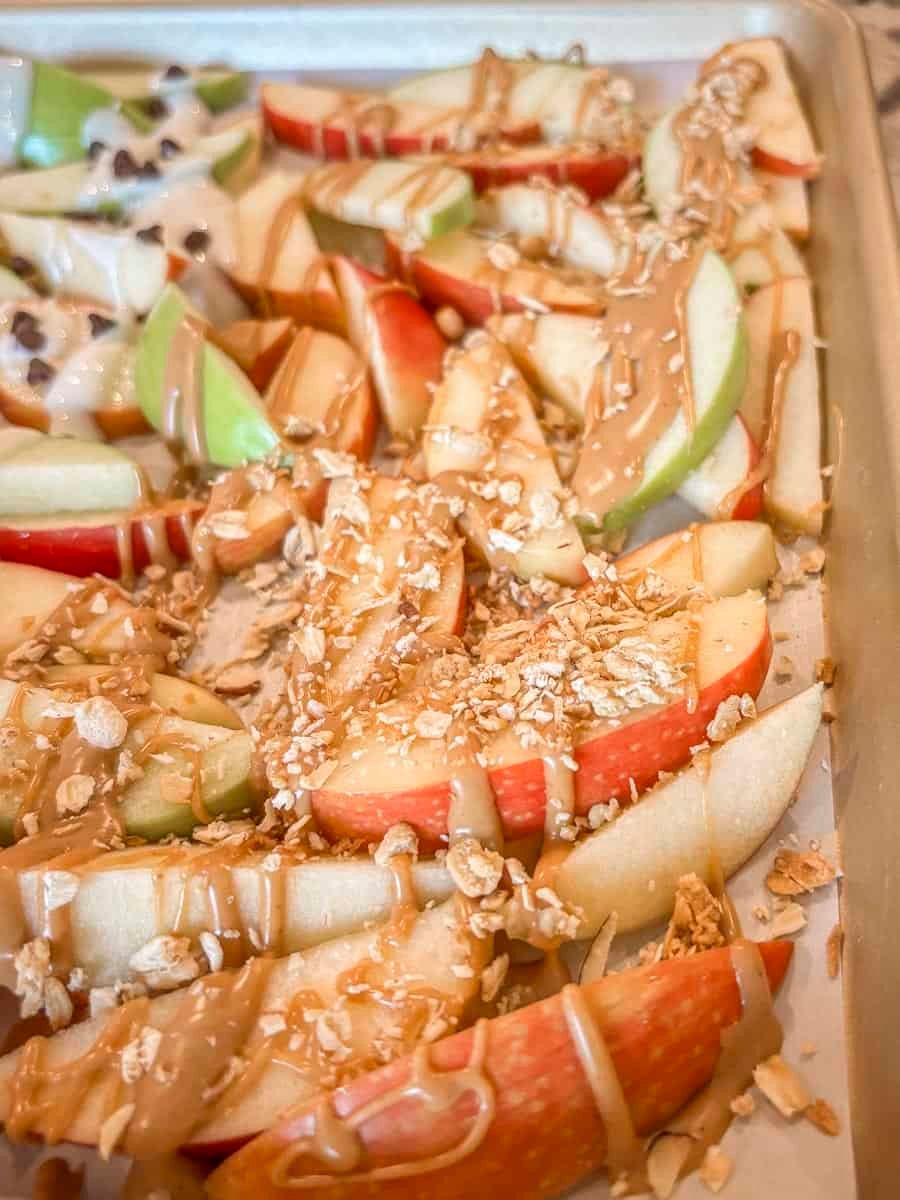 apple nachos with peanut butter drizzle and granola